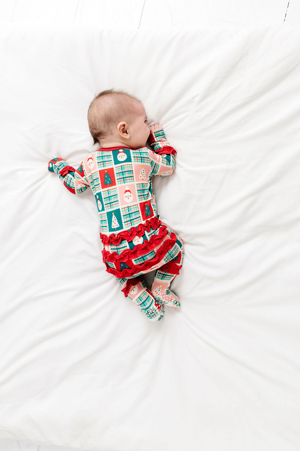 Patchwork Santas Ruffle Footy